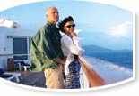 A couple enjoying the view from a cruise ship